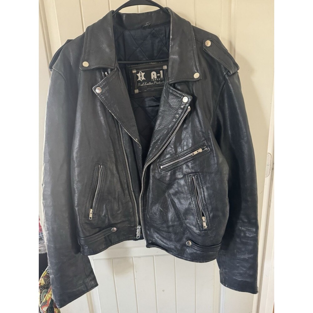 Vintage Leather Biker Jacket fits smaller